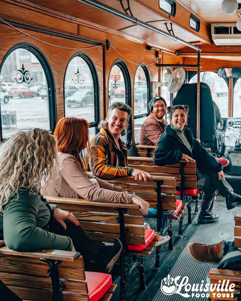 Group inside of a private trolley rental in Louisville, Kentucky